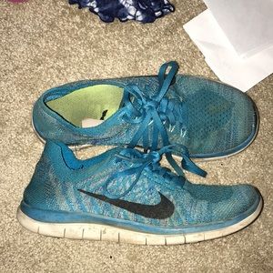 Blue/teal Nike free runs